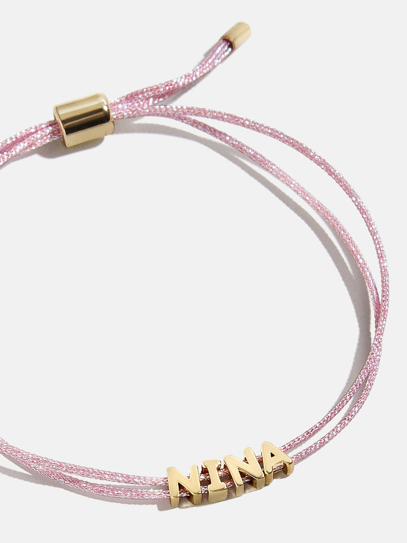 BaubleBar Custom Cord Bracelet - Metallic Pink - 
    Custom nameplate bracelet
  
