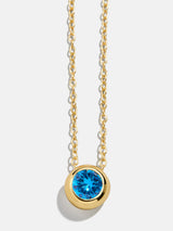 BaubleBar 18K Gold Birthstone Pendant Necklace - Blue Zircon - 
    18K Gold Plated Sterling Silver, Cubic Zirconia
  
