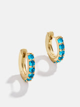 BaubleBar 18K Gold Birthstone Huggie Earrings - Blue Zircon - 
    18K Gold Plated Sterling Silver, Cubic Zirconia
  
