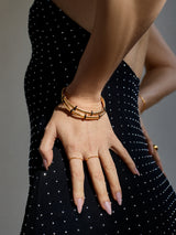 BaubleBar Eve Cuff Bracelet - Black - 
    Gold pavé coil bracelet
  
