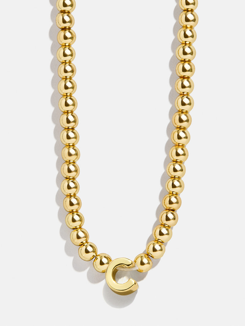 BaubleBar C - 
    Enjoy 20% Off Necklaces – For a Limited Time
  
