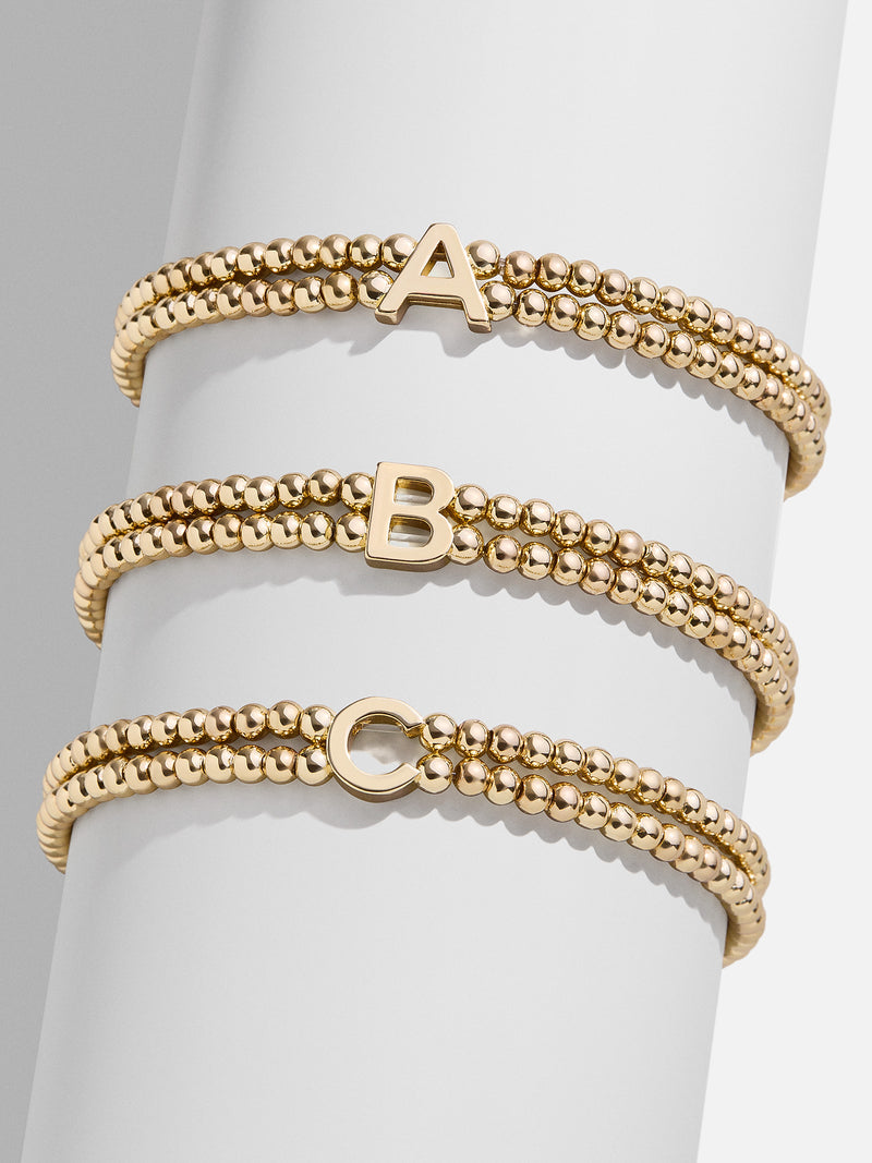 BaubleBar Ivy Initial Pisa Bracelet - Gold - 
    Gold beaded bracelet
  
