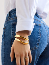 BaubleBar Raven Hinge Bangle Set - Wavy Gold Bangle - 
    2 gold wave bangles
  
