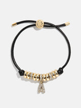 BaubleBar A - 
    Pull-tie initial bracelet
  
