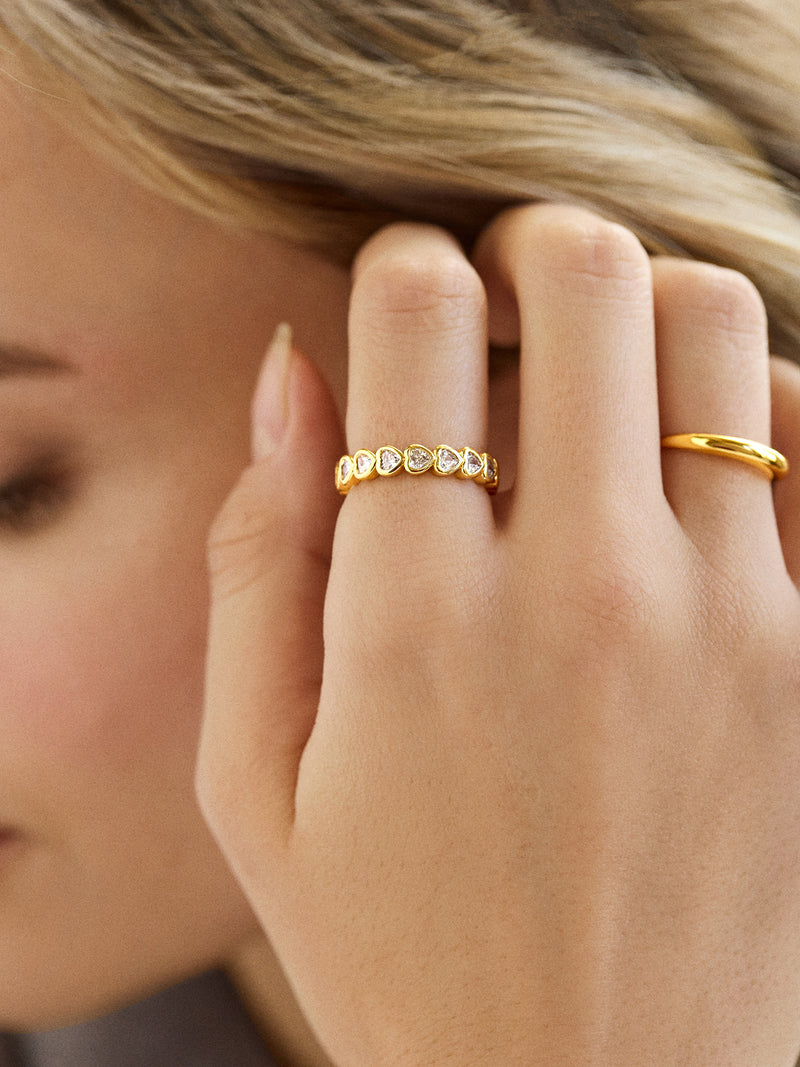 BaubleBar Adrianna Ring - Gold/Pavé - 
    Crystal bezel set repeating heart ring 
  
