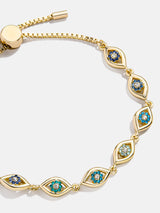 BaubleBar Aisha Evil Eye Tennis Bracelet - Blue/Gold - 
    Evil eye pull-tie tennis bracelet 
  
