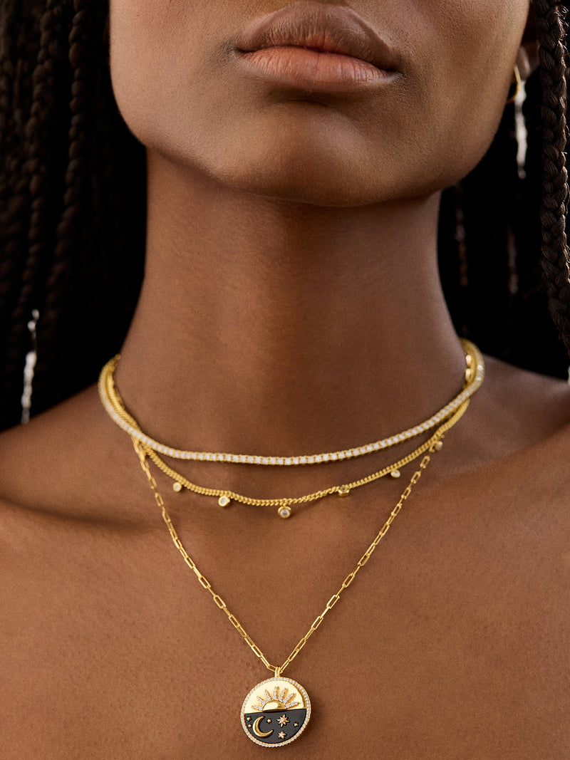 BaubleBar 18K Gold Celestial Reversible Pendant Necklace - Black - 
    20% Off 2+ Necklaces with code LAYER20
  
