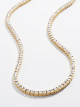 BaubleBar Gold Plated Brass - 
    Cubic Zirconia stones channel set in 18k gold plated sterling silver
  
