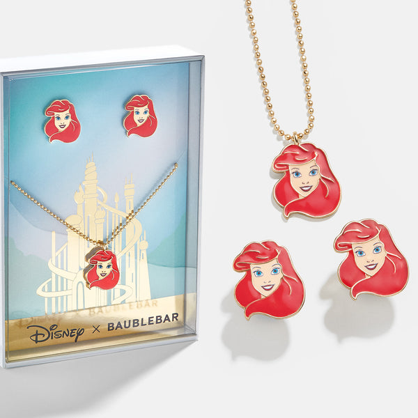 Zales Enchanted Disney Ariel 1/20 CT. T.w. Diamond Sideways Bar with Sea  Shell Necklace in 10K Gold (1 Line) | CoolSprings Galleria